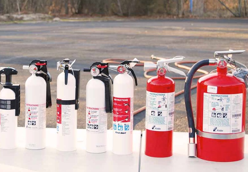 A range of fire extinguishers. Credit: BoatUS Foundation.