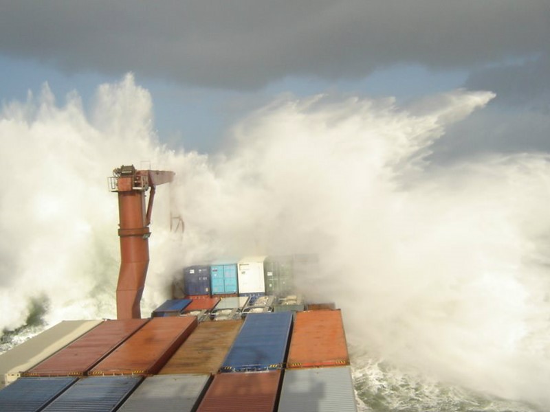 Container ship crossing a bar
