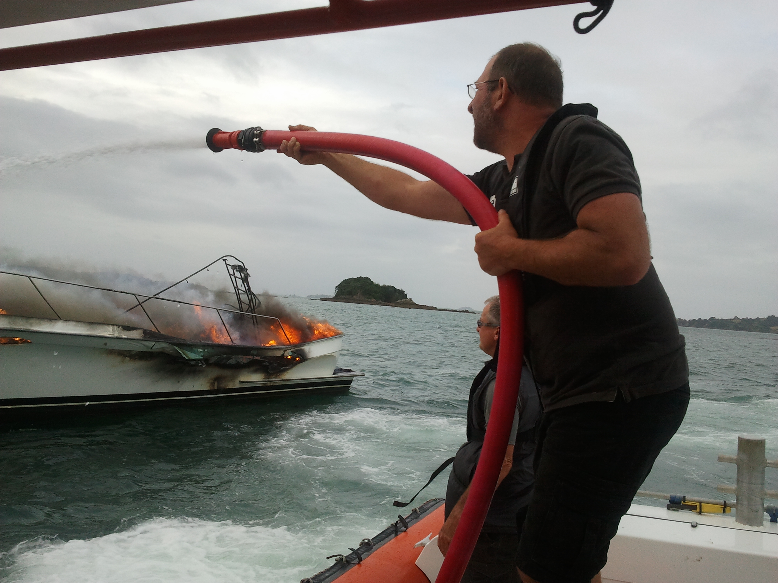 Coastguard putting fire out