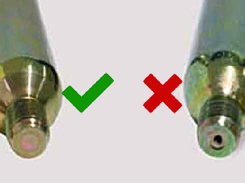 A used CO2 cylinder (right) will be punctured, and needs to be replaced